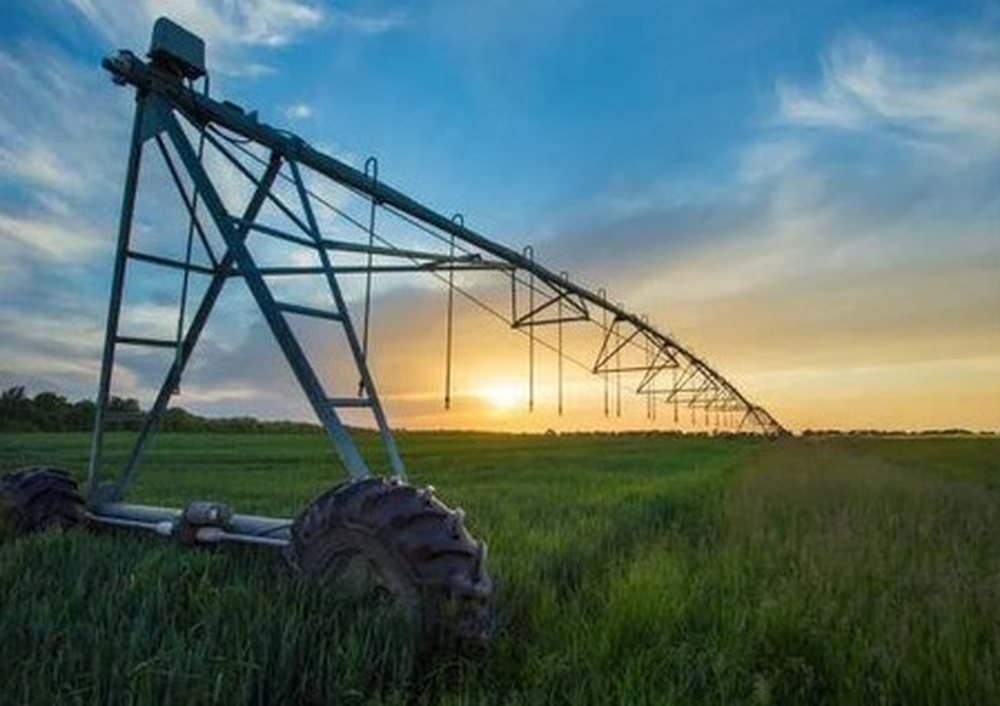 Centre pivot irrigation system representing farm pump and level control