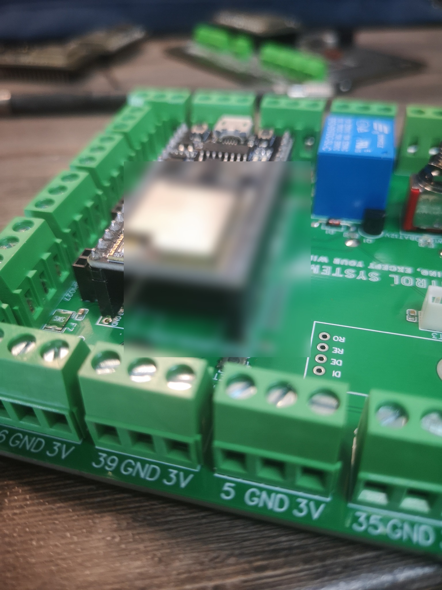 Angled close-up photo of a WiFe Control Systems custom control PCB